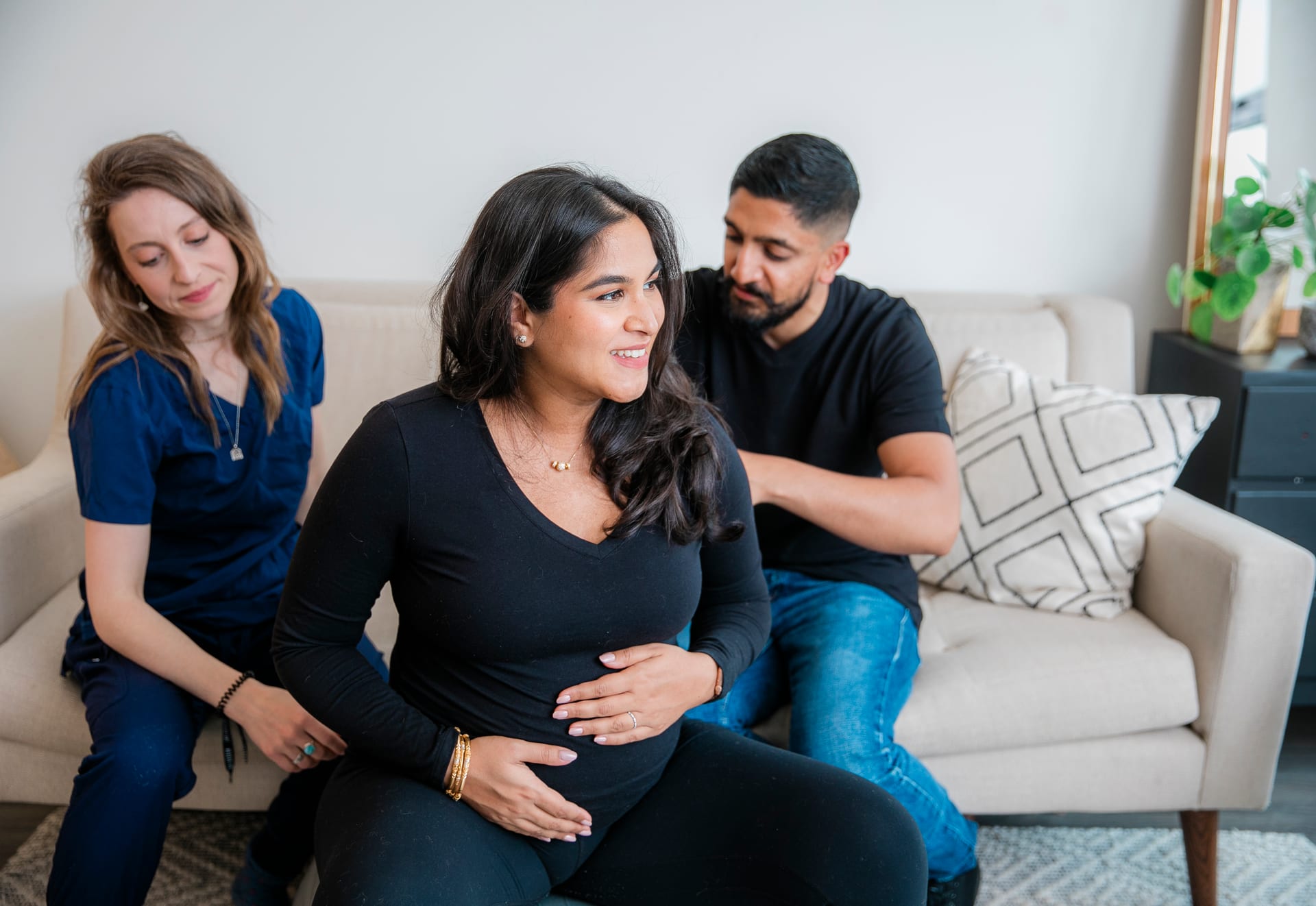 Your Downtown Doula — doula supporting a pregnant family